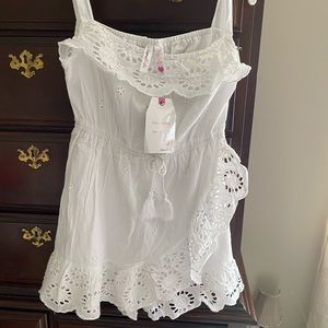 Girls size 8 white eyelet romper. New with tags.